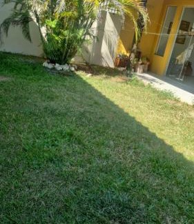 Centro House | Hospedagem Sil e Jean quarto família, cozinha compartilhada com outros hóspedes