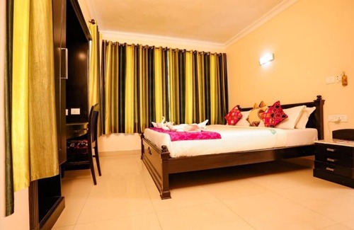 Munnar Hotel | HOTEL EMERALD INN