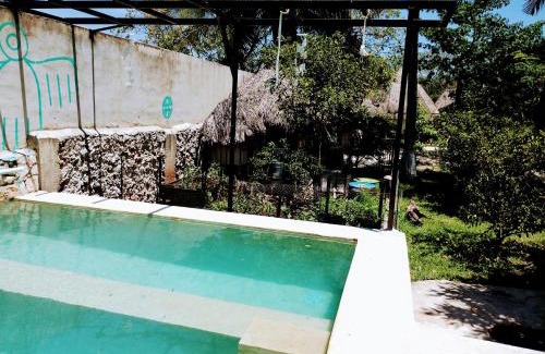 Izamal Hotel | Hotel y Museo Aldea Maya Toktli Orígenes - Suite Casa Maya 3 Culturas - Alberca, Wifi Starlink, Tour Museo