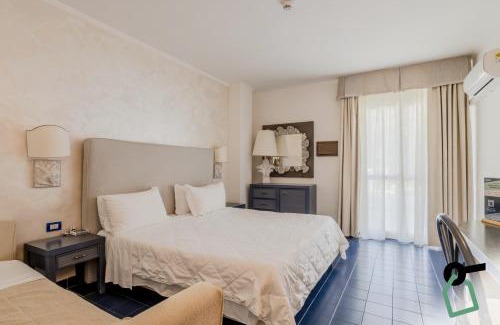 Mattinata Hotel | HOTIDAY Room Collection - Mattinata Faraglioni