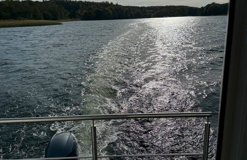 Dobin am See Boat Rental | House Boat 'Seahome' with Lake View, Private Terrace and Wi-Fi