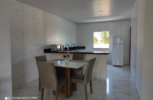 Porto de Sauipe House | house of peace meeting river and sea