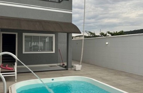 Coqueiral House | House with pool and 3 suites facing the sea