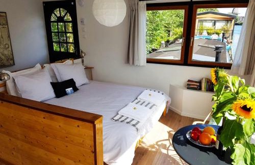 Oostelijke Eilanden en Kadijken Bed & Breakfast | Houseboat Concordia B&B