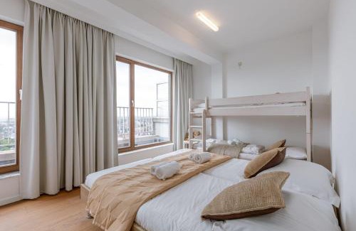 Wenduine Apartment | Huswell - Seaside duplex apartment with four terraces