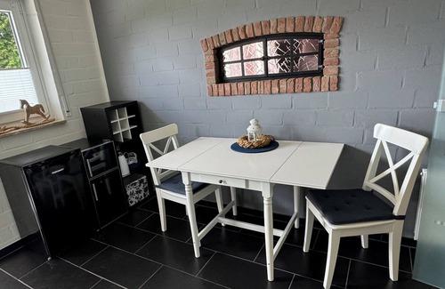 Westeraccumersiel Apartment | Huus Achterdiek - Erdgeschosswohnung "captains Deck" mit Sauna