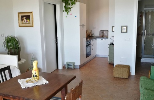 Telti Apartment | Idyllic apartment with unobstructed views to the Tyrrhenian sea