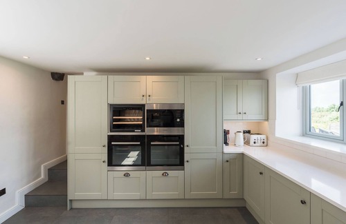 Pentraeth House | Incredible stay overlooking Red Wharf By sleeping up to 8 guests with hot tub & garden lounge area