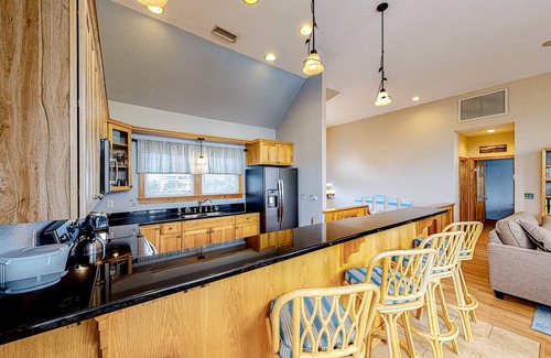 Wind Over Waves House | Incredible two-story home with private pool, hot tub, & game room
