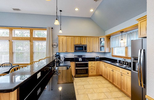 Wind Over Waves House | Incredible two-story home with private pool, hot tub, & game room