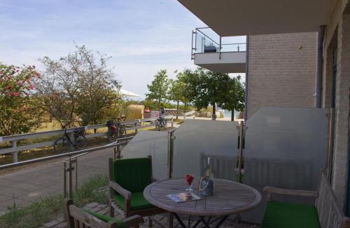 Fehmarn House | Inselblume 48 - Kuschlige Ferienwohnung in der Strandburg