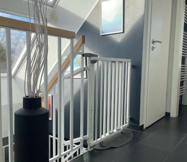 Finkenwerder Apartment | InselSuites FinkenNest Airbus Finkenkwerder 125 m2 Kamin