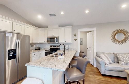 Dauphin Island House | Inviting home near the beach with balcony, full kitchen, central AC, & W/D