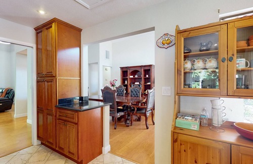 Fremont House | Inviting home with pool, fitness area, fireplace, & W/D