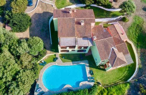 Punta De Su Turrione Villa | ISA-Villas with air conditioning, shared pool and private outdoor space just a few km from La Pelosa beach