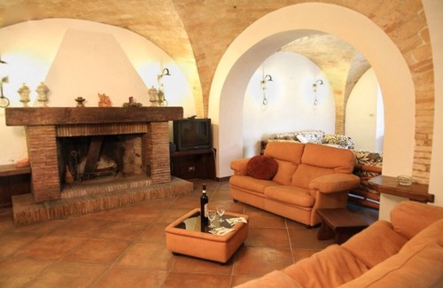 Loreto Aprutino Villa | Ancient farmhouse with vaulted ceilings, surrounded by centuries-old olive trees and splendid views