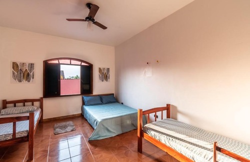 Raul Cury House | Itanhaém Casa ampla com piscina e churrasqueira a 300m da praia