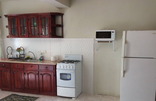Ewarton Apartment | Kathy's Cool Getaway is located near to shopping and transportation.