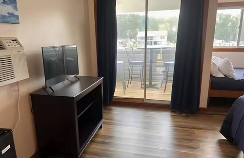 Coinjock Apartment | Knot Four- Balcony View of ICW- Dog Friendly!