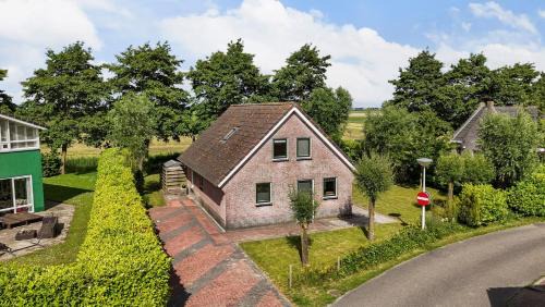 Tzummarum House | Komfortables Ferienhaus mit Garten, Weitblick und Whirlpool