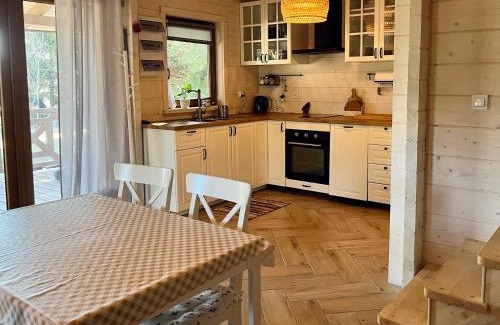 Karwie House | KrzyweProgi - domek na Mazurach nad jeziorem Krzywe