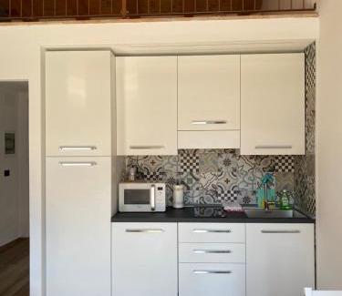 Cuneo Apartment | La scala dei sogni