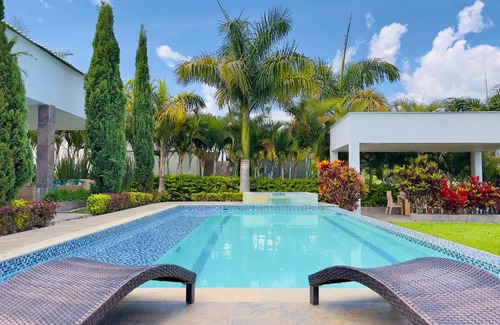 Calima Villa | Lago Calima Bliss: Secret Garden Paradise in Darien
