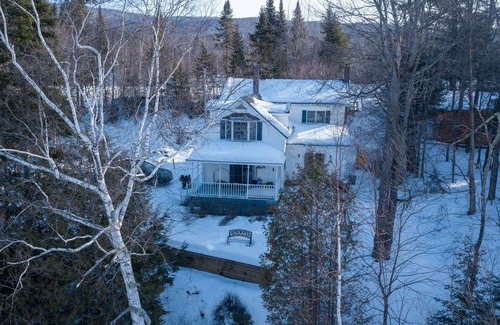 Eden House | Lake front home with in-deck outdoor hot tub and spectacular lake views!