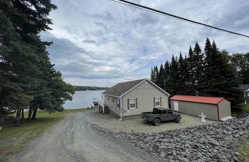 Eagle Lake Cottage | Lakefront cottage with private beach, near trails