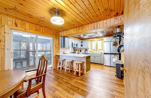 Lac du Flambeau Cottage | Lakefront dog-friendly retreat with sauna, dock, canoe, paddle board, & firepit