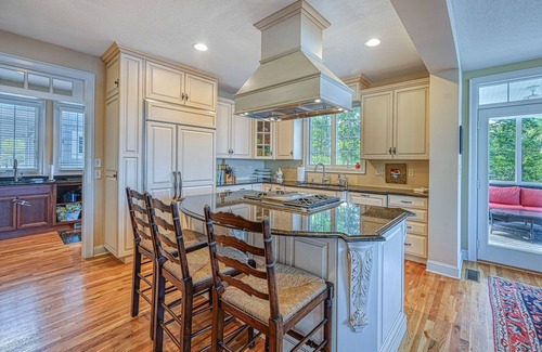 Moneta House | Lakefront home with amazing views, dock, firepit, foosball, patio, garage studio