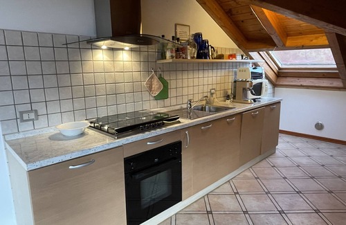 Nesso Apartment | Lakefront Views with Lake Access & Dock for Swimming