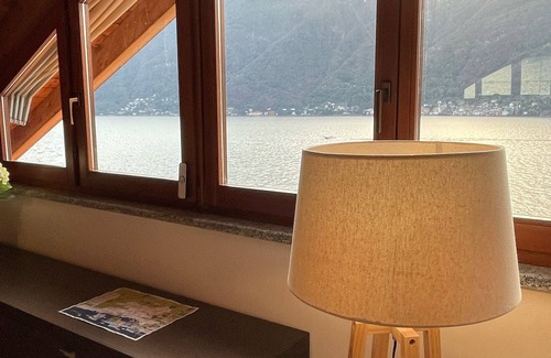 Nesso Apartment | Lakefront Views with Lake Access & Dock for Swimming