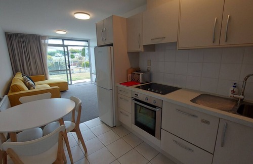 Hilltop Apartment | Lakeside Gem: Your Modern Retreat