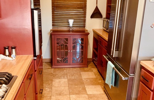 Springdale House | Lakeside house with fireplace, deck, and a fenced backyard with firepit.