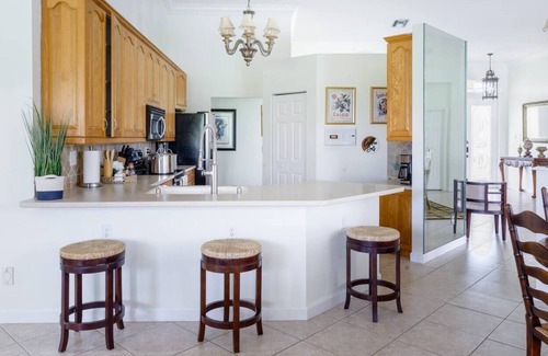 Greenacres Villa | Lakeside Paradise W/Heated Pool near the Beach