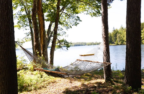 Ellsworth Cabin | Lakeside Pine Cone Cabin 30' private beach & dock, Fireplace , Kayaks, Canoe