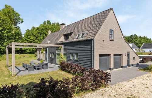 Ouddorp Villa | Landgoed Hermitage - Villa Euphoria - XXL Zwemspa - Max 10 personen