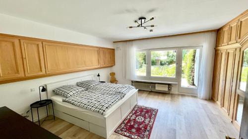 Lenggries Apartment | Large holiday apartment with sauna, terrace, garden and open fireplace