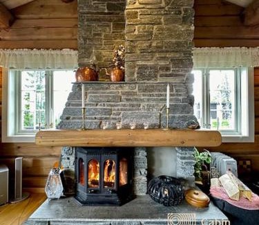 Ringsaker House | Large log cabin at Sjusjøen with sauna, fireplace and panoramic view