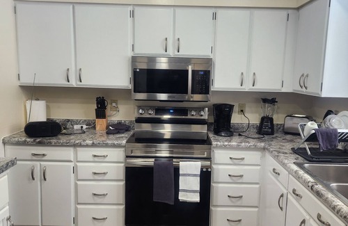 Fall River Cabin | Lazy Lake Retreat 3 bed 2 bath. Includes sauna, kayaks, paddle boards, hot tub.