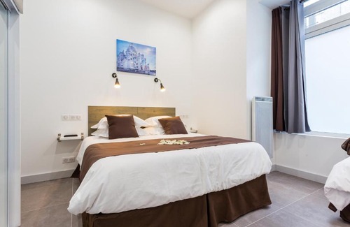 Quartier des Grandes-Carrieres Apartment | Le Logis de Montmartre