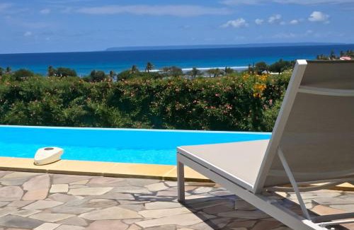 Saint-Francois Villa | Les villas "Fenêtres Sur Plage" - Villas Créoles de charme , vue exceptionnelle face mer et plage & piscines privées à débordement