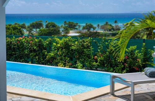 Saint-Francois Villa | Les villas "Fenêtres Sur Plage" - Villas Créoles de charme , vue exceptionnelle face mer et plage & piscines privées à débordement