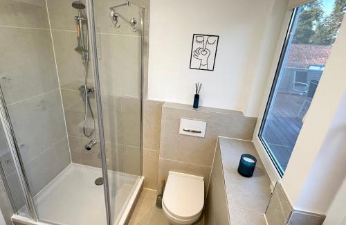 Kaltenweide Apartment | LGH-Moderne, ruhige Wohnung, Nähe zum Flughafen und Autobahn, 24h-self-check-in, vollausgestattet, DisneyPlus, Waschmaschine