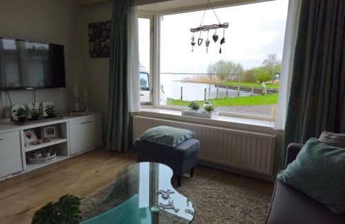 Sumar Ski Chalet | Liefdevol chalet aan het meer