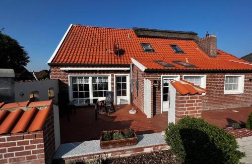 Osteel House | Lindenhuus-Urlaub unter einem Teilreetdach-Terrasse - Nahe Norden-Norddeich