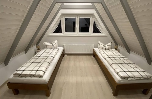 Barmstedt Apartment | Living under the roof
