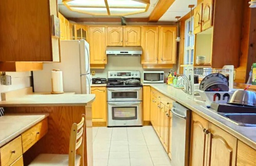 Crescent Beach House | Located close to tourist hotspots! Spacious and comfy bedrooms