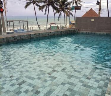 Cruz das Almas Apartment | Loft beira-mar com frente e vista para o mar